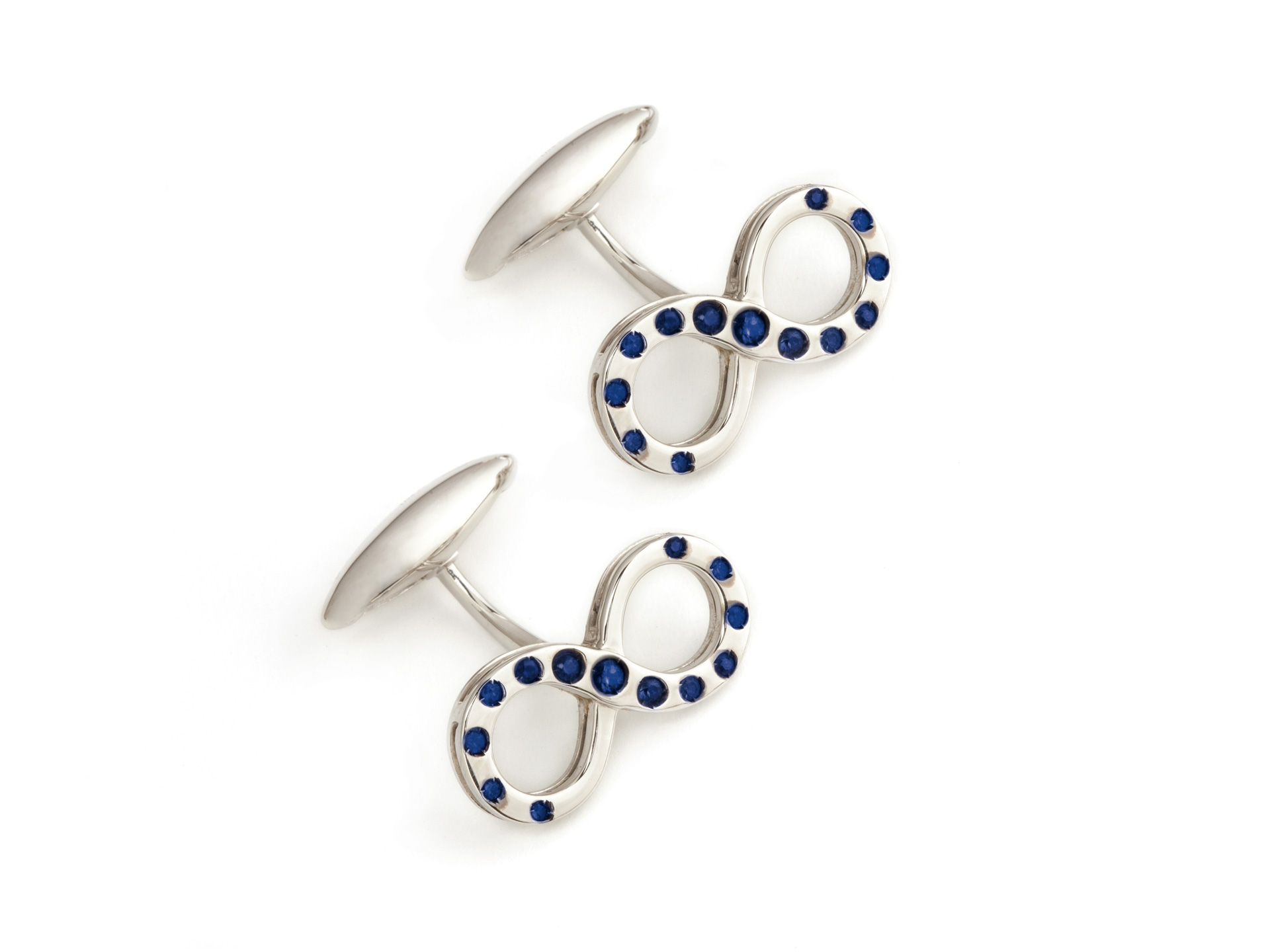 Infinity shaped in white gold with blue sapphires cufflinks