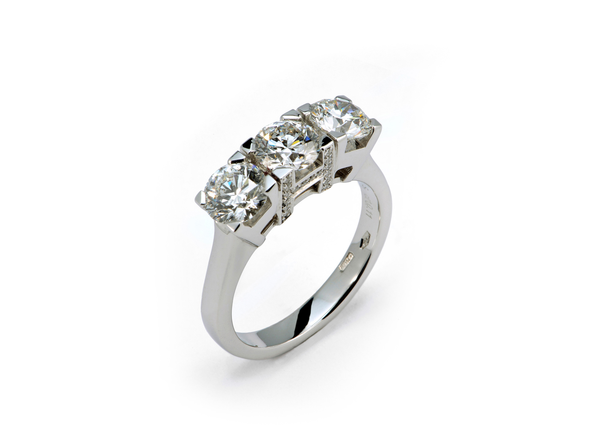 Three stone diamond ring in white gold
